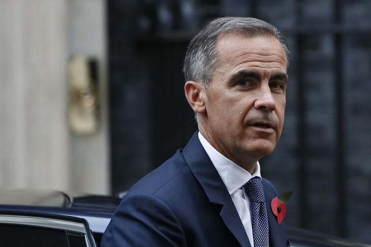 © Reuters. Bank of England governor Mark Carney arrives at Number 10 Downing Street in central London