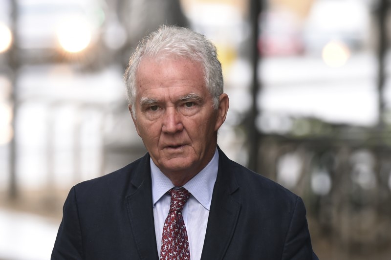 © Reuters. Former Chairman of Anglo Irish bank, Sean Fitzpatrick, arrives at the Criminal Courts of Justice in Dublin