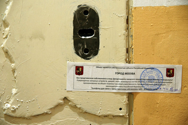 © Reuters. Office door of rights group Amnesty International is sealed off in Moscow