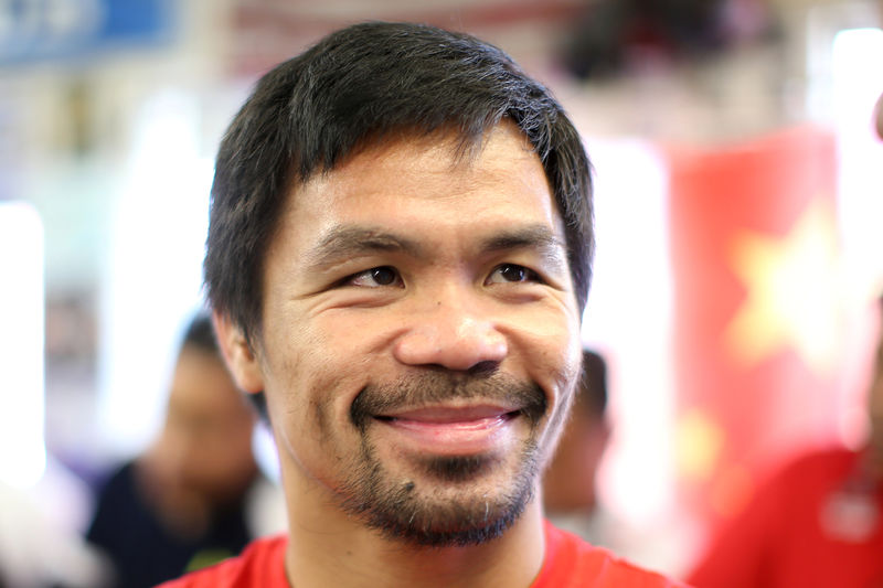 © Reuters. Boxer Manny Pacquiao of the Philippines works out in advance of his WBO welterweight bout against Jessie Vargas, in Los Angeles