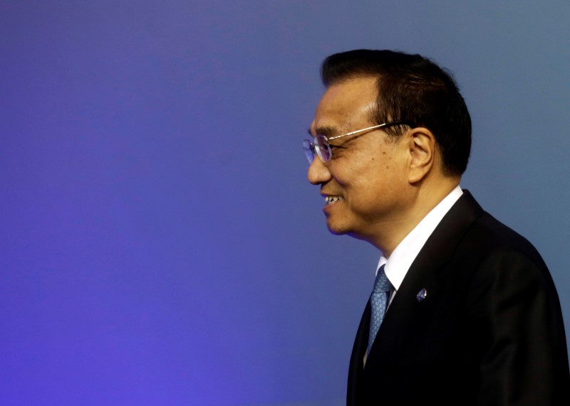 © Reuters. China's Premier Li Keqiang arrives to the meeting of heads of government Central and Eastern European countries and China in Riga