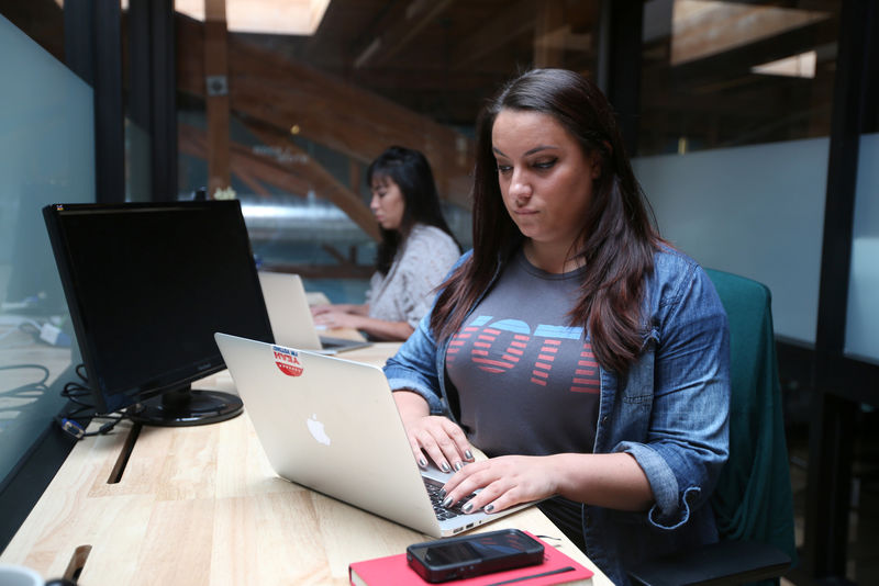 © Reuters. Rock the Vote Digital Director Tabatabaie works on her computer in Los Angeles