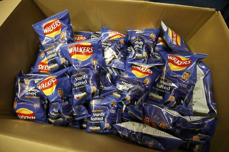 © Reuters. General view of Limited Edition Jamie Vardy Walkers crisps outside the King Power Stadium before the Leicester City v Chelsea match