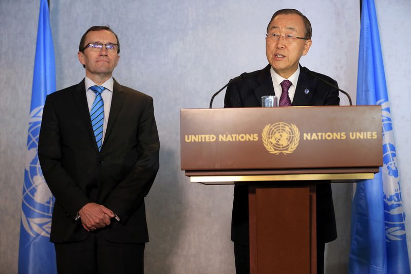 © Reuters. UN Secretary-General Ban Ki-moon and UN special envoy Espen Barth Eide attend the Cyprus reunification talks in the Swiss mountain resort of Mont Pelerin