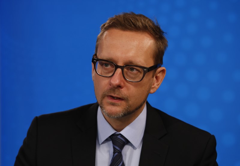 © Reuters. Asia Securities Industry & Financial Markets Association (ASIFMA) Chief Executive Mark Austen speaks following a Reuters China Summit interview in Hong Kong