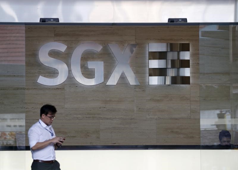 © Reuters. A man leaves the SGX Singapore Exchange building in Singapore's central business district