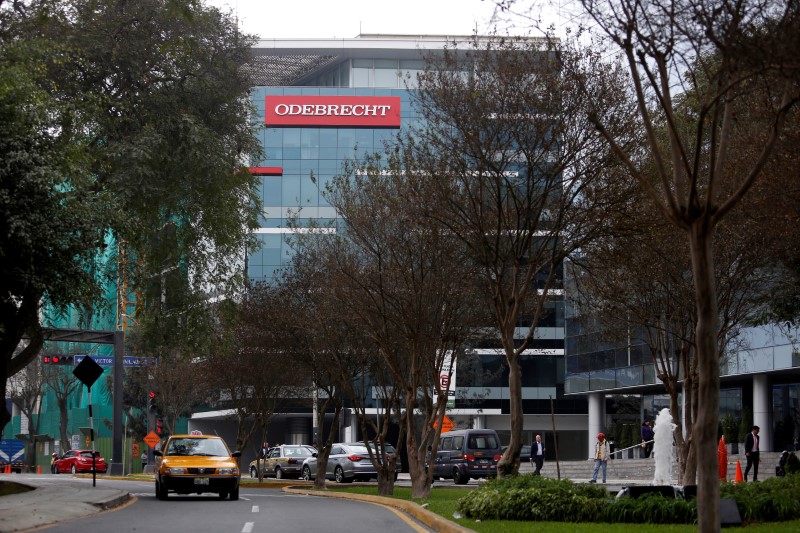 © Reuters. A sign of the Odebrecht SA construction conglomerate is pictured in Lima