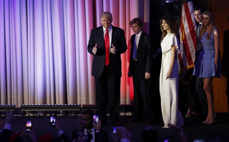 © Reuters. U.S. President-elect Donald Trump is followed by members of his family as he arrives to address supporters at his election night rally in New York