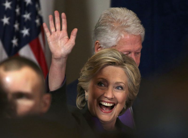 © Reuters. Democratic presidential candidate Hillary Clinton, and husband, former U.S. President Bill Clinton, arrive for  her concession speech in New York