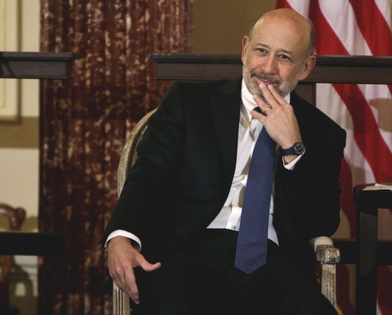 © Reuters. FILE PHOTO - Goldman Sachs Chairman and CEO, Lloyd Blankfein, waits to speak at the 10,000 Women/State Department Entrepreneurship Program at the State Department in Washington