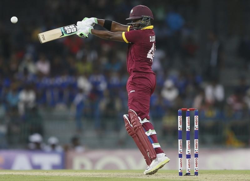 © Reuters. West Indies' Bravo plays a shot during their first One Day International cricket match against Sri Lanka in Colombo