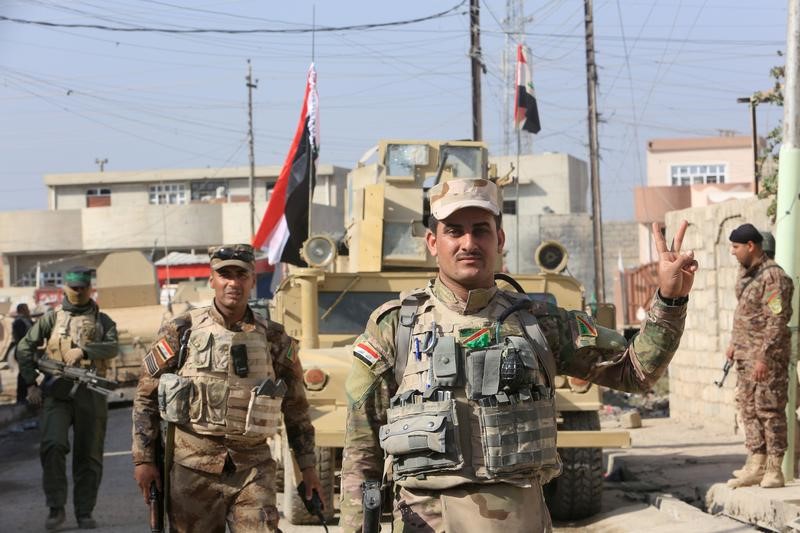 © Reuters. الطريق إلى العنبر 17.. معاناة صحفي غطى أهوال العراق
