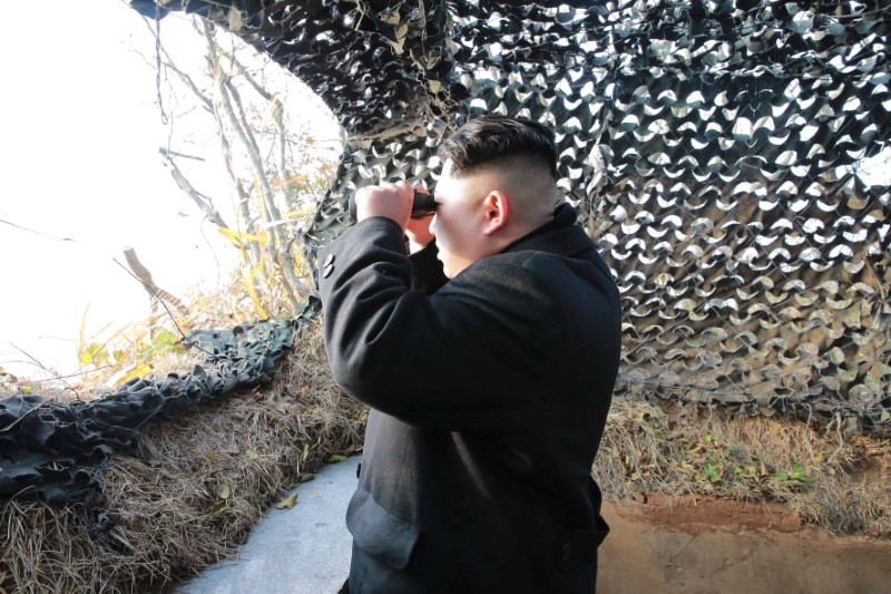 © Reuters. North Korean leader Kim Jung-un inspects Galido outpost and Jangjedo defending force located in the far south of Southwest sea in North Korea in this undated photo released by North Korea's Korean Central News Agency