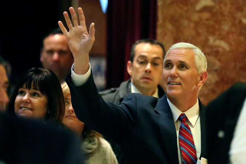 © Reuters. Vice president-elect Mike Pence arrives at Donald Trump's Trump Tower in New York