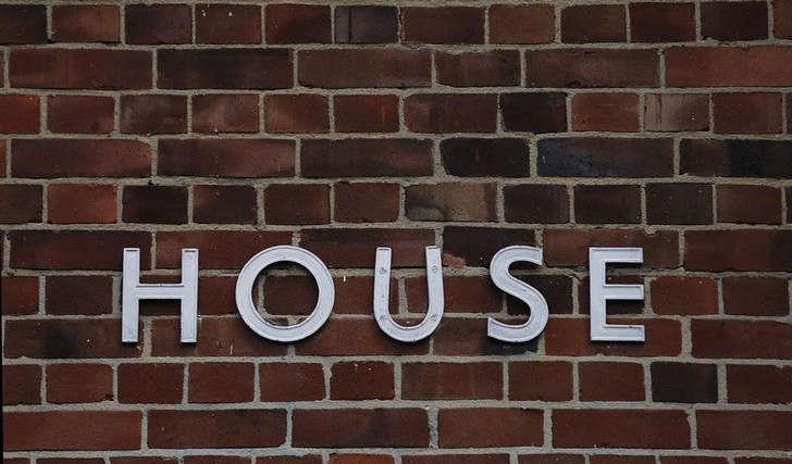 © Reuters. A sign is seen on a block of flats in London