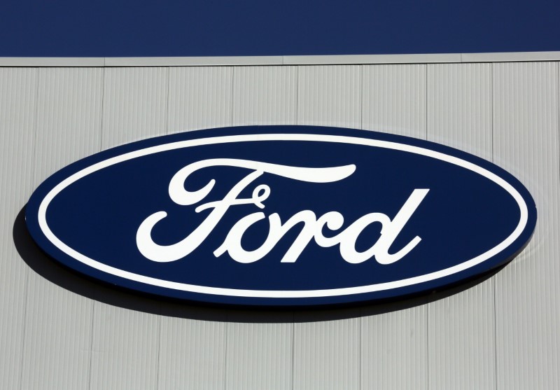 © Reuters. A Ford logo is seen on a wall of the Oakville Assembly Plant as workers with UNIFOR attended a ratification vote nearby