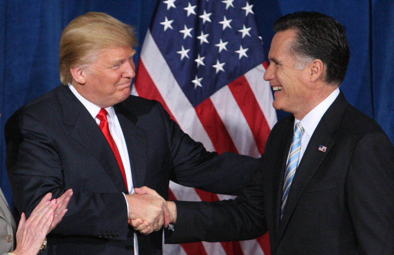 © Reuters. Businessman and real estate developer Donald Trump greets U.S. Republican presidential candidate and former Massachusetts Governor Romney after endorsing his candidacy for president at the Trump Hotel in Las Vegas