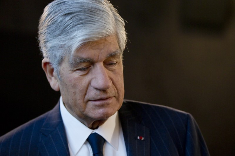 © Reuters. Maurice Levy, French advertising group Publicis Chief executive, arrives to attend the company's 2014 annual results presentation in Paris