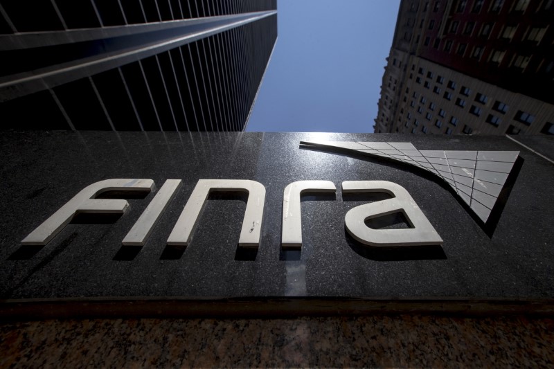 © Reuters. A sign for the Financial Industry Regulatory Authority (FINRA) is seen outside the offices in New York's financial district