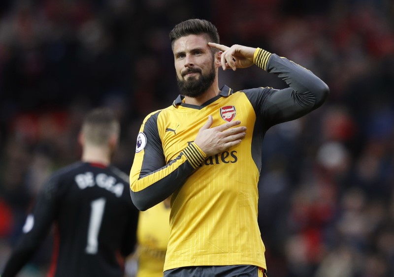 © Reuters. Arsenal's Olivier Giroud celebrates after the game