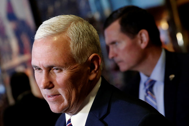 © Reuters. U.S. Vice President Elect Mike Pence speaks to members of the news media upon his arrival at Trump Tower in New York