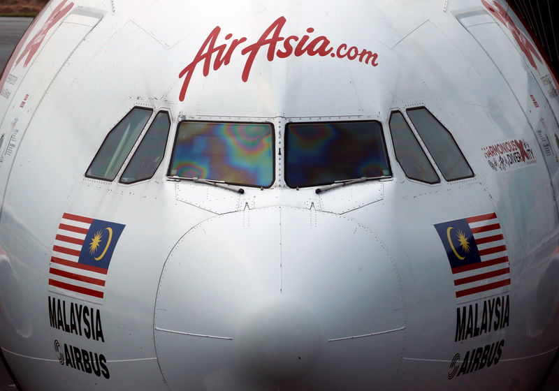 © Reuters. An AirAsia plane sits on the tarmac at Kuala Lumpur International Airport