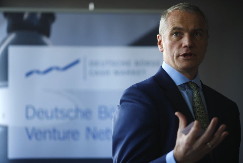 © Reuters. Kengeter, CEO of Deutsche Boerse talks to the media during the presentation of FinTec start-up facilities provided by Deutsche Boerse in Frankfurt