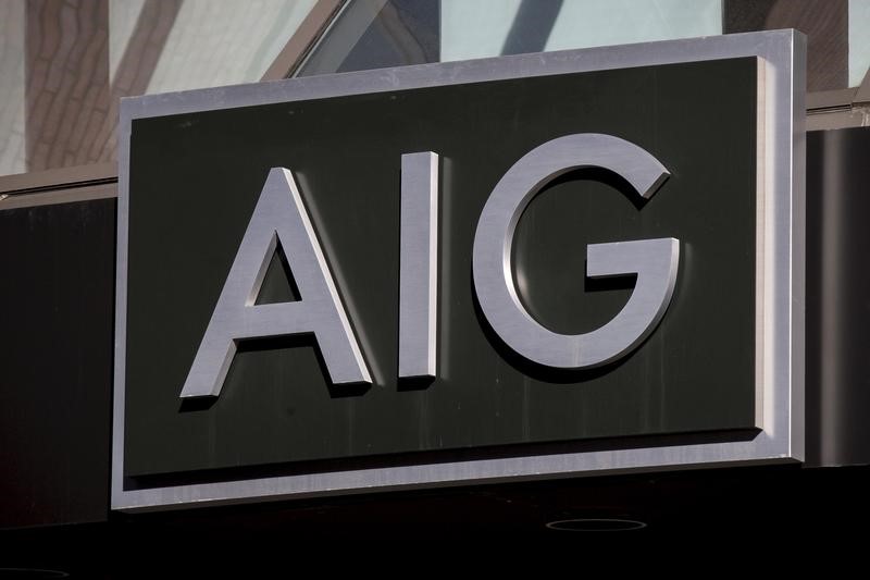 © Reuters. The AIG logo is seen at its building in New York's financial district