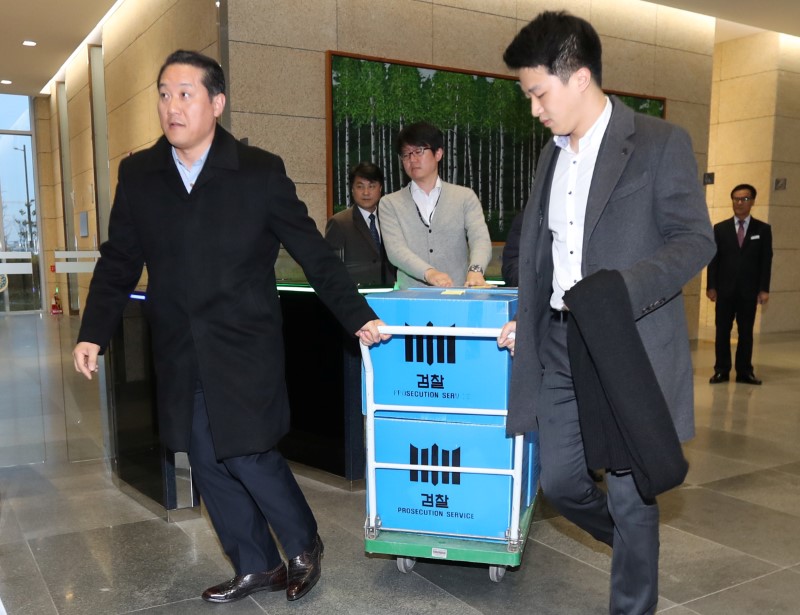 Samsung Group, pension fund offices raided in growing South Korea scandal