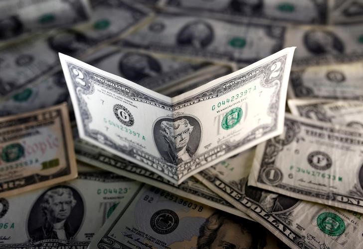 © Reuters. الدولار يستقر ومستوى قياسي منخفض لليوان في السوق الخارجية