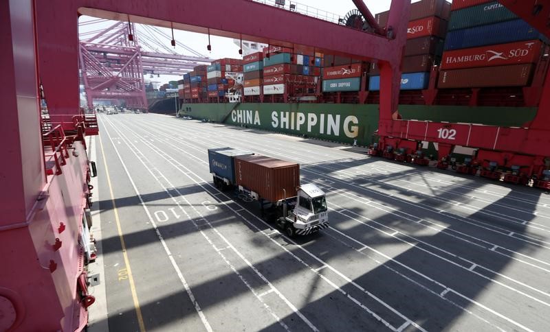 © Reuters. Truck transports containers at Hanjin Shipping's container terminal at the Busan New Port in Busan