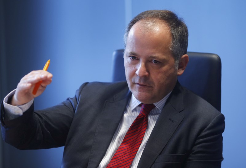 © Reuters. Coeure, executive board member of the ECB, speaks during an interview with Reuters in Frankfurt