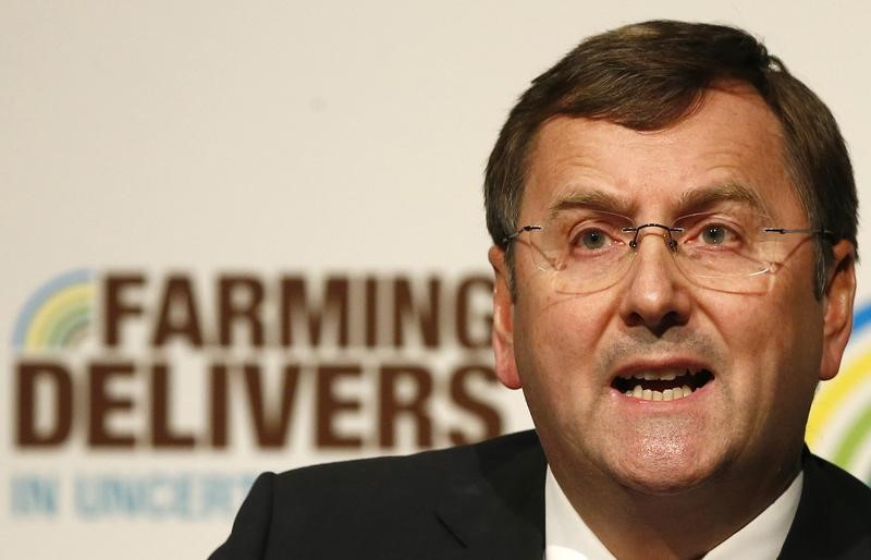 © Reuters. The Chief Executive of Tesco plc Philip Clarke speaks during the National Farmers Union conference in Birmingham
