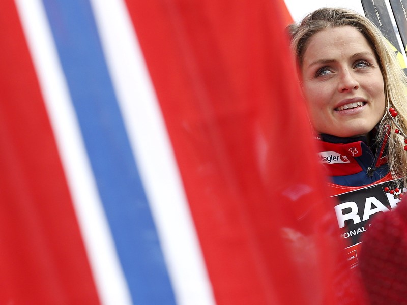 © Reuters. FIS Tour de Ski overall women winner Johaug looks on during the podium ceremony, after the women's cross-country skiing 9km final climb free pursuit race on the Alpe Cermis