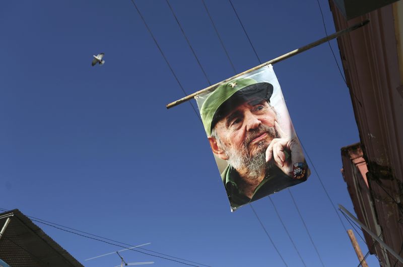 © Reuters. An image of Cuba's late President Fidel Castro is displayed in the Regla neighborhood of Havana