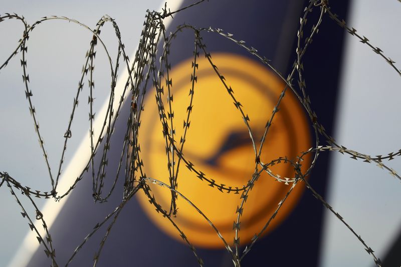 © Reuters. The tail of a parked plane is pictured during a pilots strike of German airline Lufthansa at Frankfurt airport