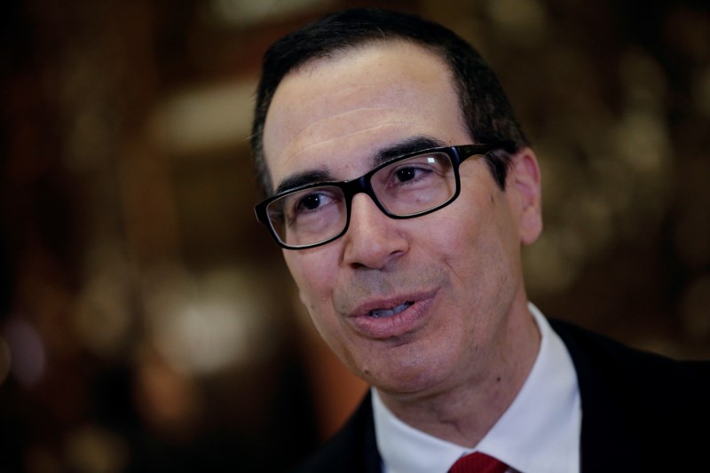 © Reuters. Steven Mnuchin, U.S. President-elect Donald Trump's reported choice for U.S. Treasury Secretary, speaks to members of the news media upon his arrival at Trump Tower in New York