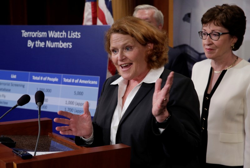 © Reuters. Senator Heidi Heitkamp (D-ND) speaks at a news conference with a bipartisan group of senators on Capitol Hill in Washington, D.C., U.S., to unveil a compromise proposal on gun control measures