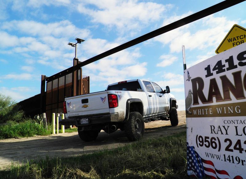 © Reuters. A gate in the U.S. border fence with Mexico is seen in this photo taken at the Loop family farm in Brownsville