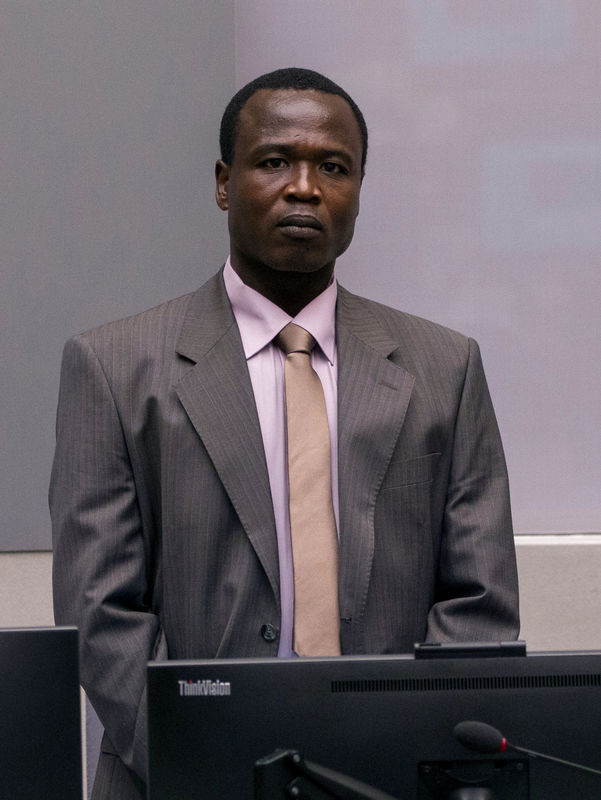 © Reuters. Dominic Ongwen of Uganda stands in the courtroom of the International Criminal Court during the confirmation of charges in The Hague