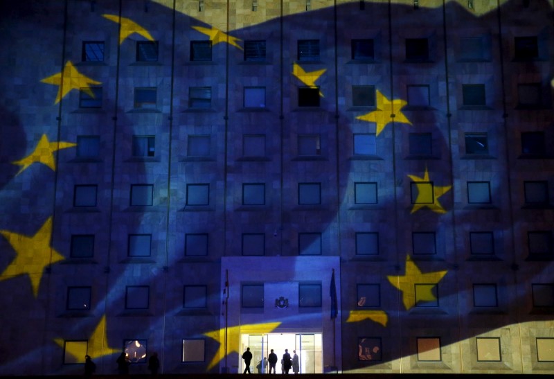 © Reuters. European flag is projected on the government building in Tbilisi