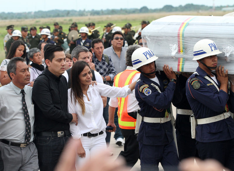 Grieving Brazilian town receives bodies of soccer plane-crash victims