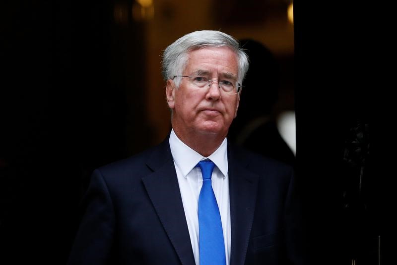 © Reuters. Britain's Secretary of State for Defence Michael Fallon leaves after attending a cabinet meeting at Number 10 Downing Street in London