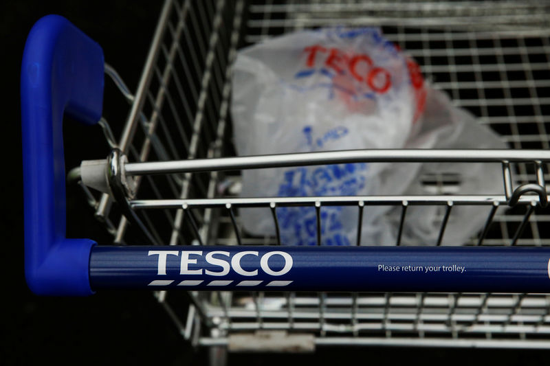 © Reuters. A discarded carrier bag is seen in a shopping trolley outside a Tesco supermarket in London