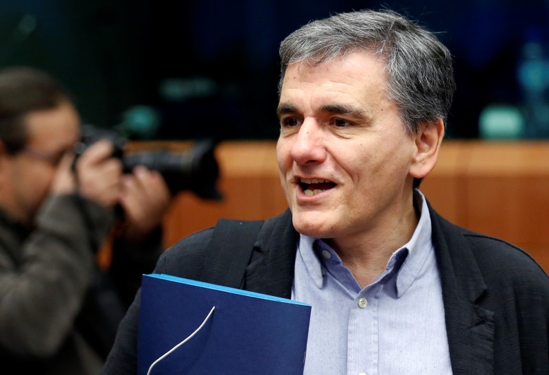 © Reuters. Greek Finance Minister Tsakalotos arrives at a euro zone finance ministers meeting in Brussels