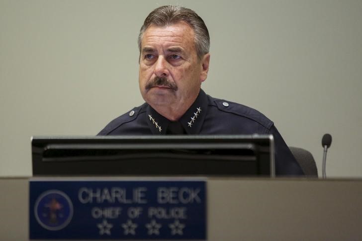 © Reuters. FILE PHOTO - LAPD Police Chief Charlie Beck listens as people speak about the death of Ezell Ford during a  meeting of the Los Angeles Police Commission in Los Angeles