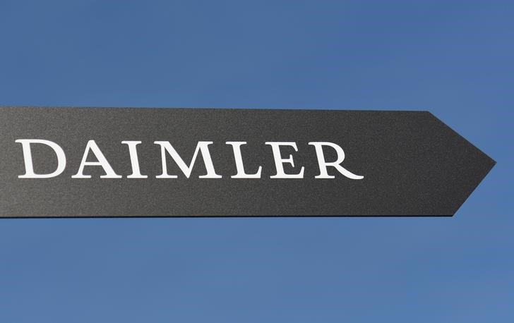 © Reuters. Daimler AG sign is pictured at the IAA truck show in Hanover