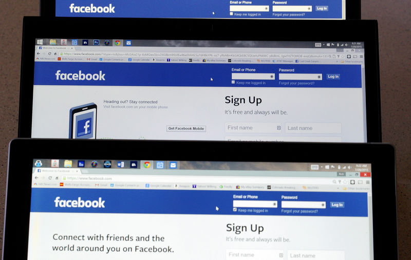 © Reuters. Computer screens display the Facebook sign-in screen in this photo illustration taken in Golden