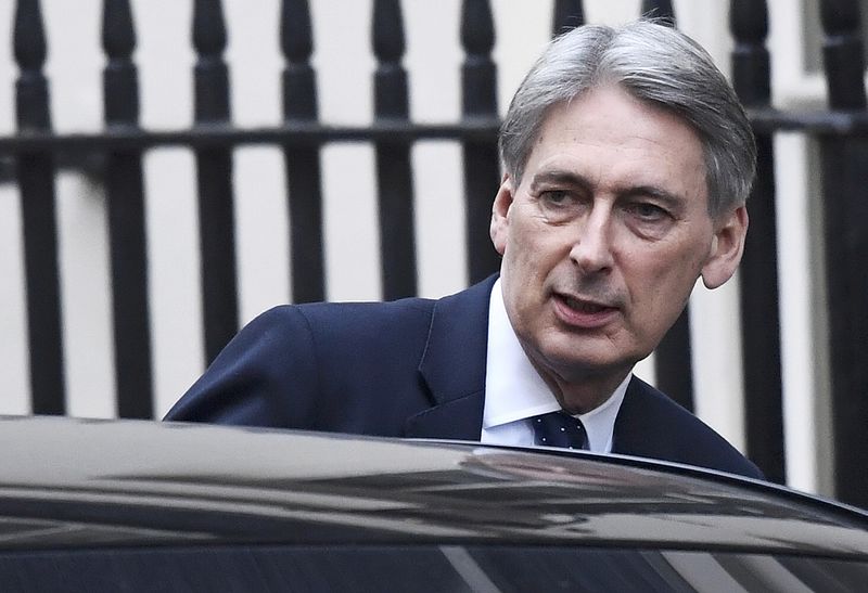 © Reuters. Britain's Chancellor of the Exchequer Philip Hammond leaves Downing Street after a cabinet meeting in London