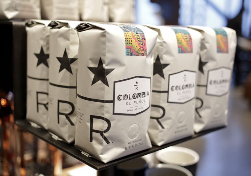 © Reuters. Bags of Starbucks small-lot coffee featuring the new "reserve" logo is on display at a preview of its new Reserve Roastery and Tasting Room in Seattle